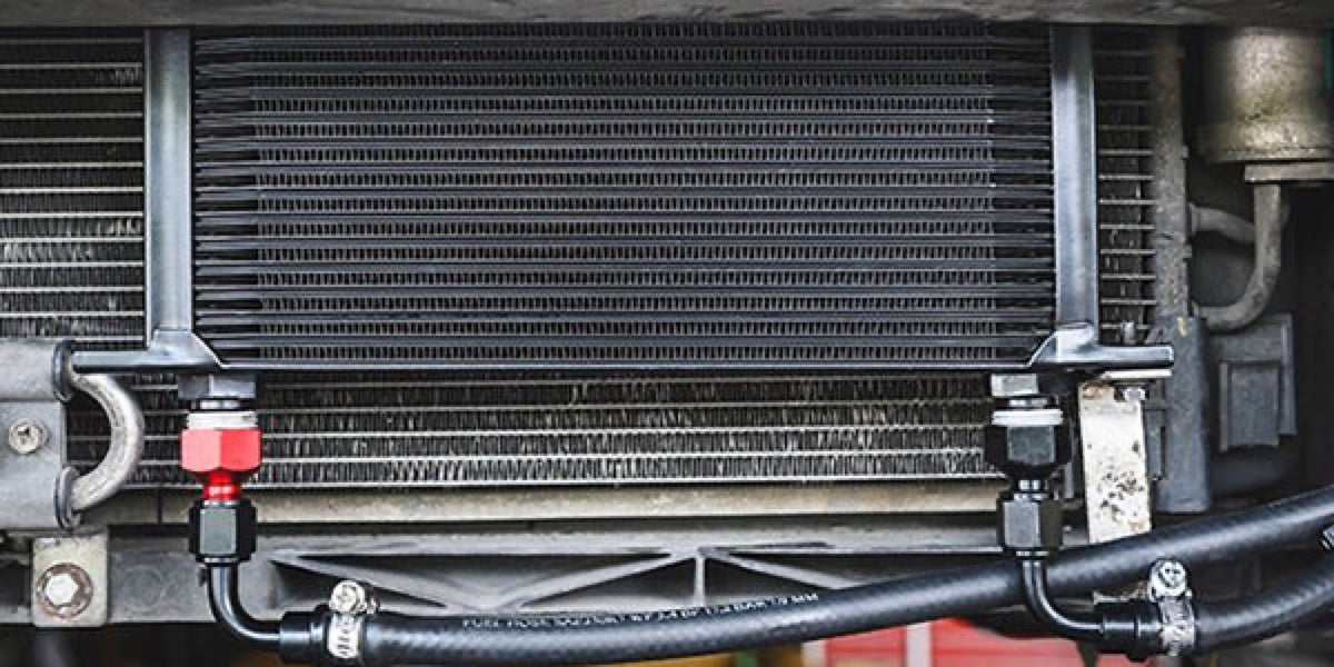 Installed cooler and hose connections within an equipment cooling pack.